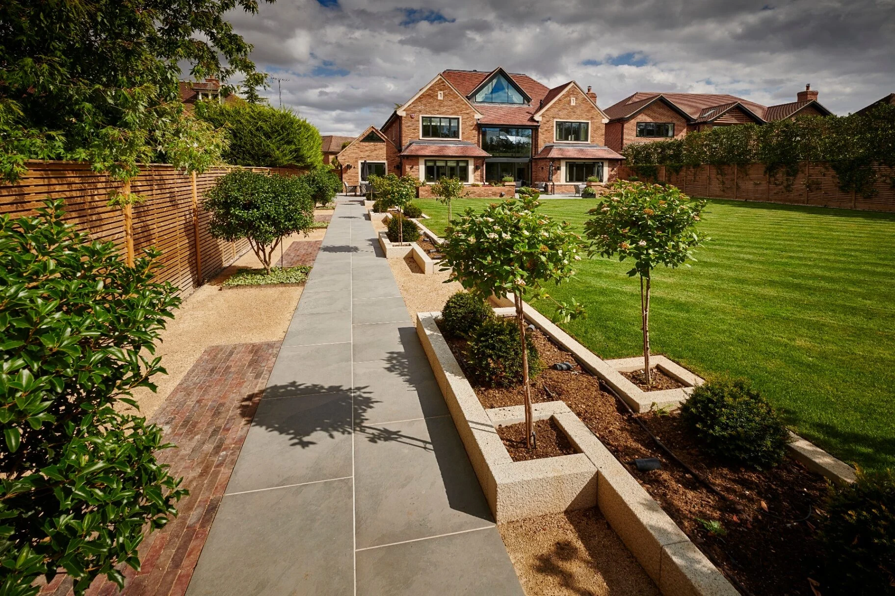 The Manor Promenade — garden design and build project by Refined Landscapes