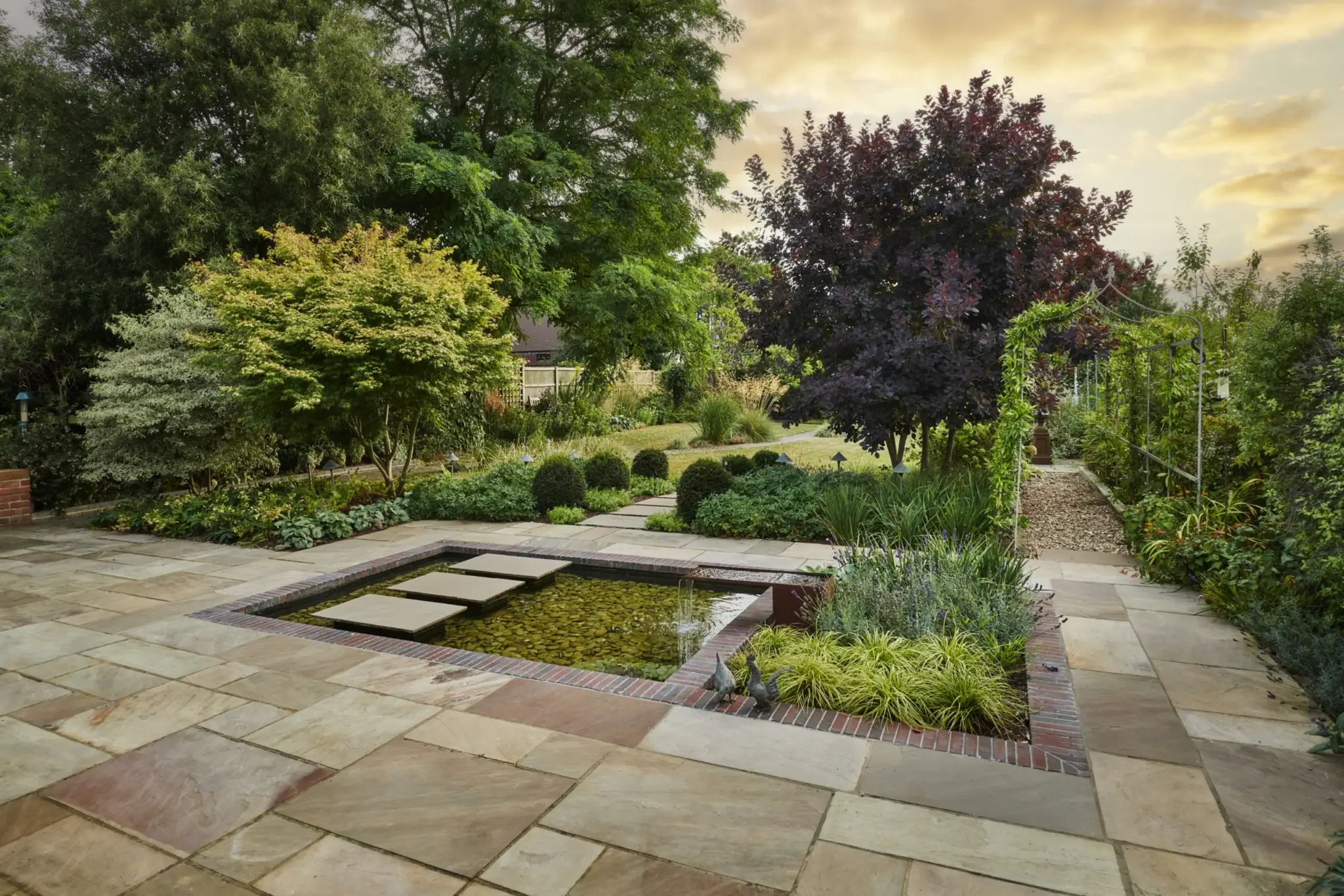 A mature, refined, cared-for garden by Refined Landscapes
