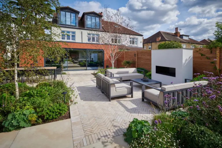 Fire pit and gathering space in a Refined Landscapes garden