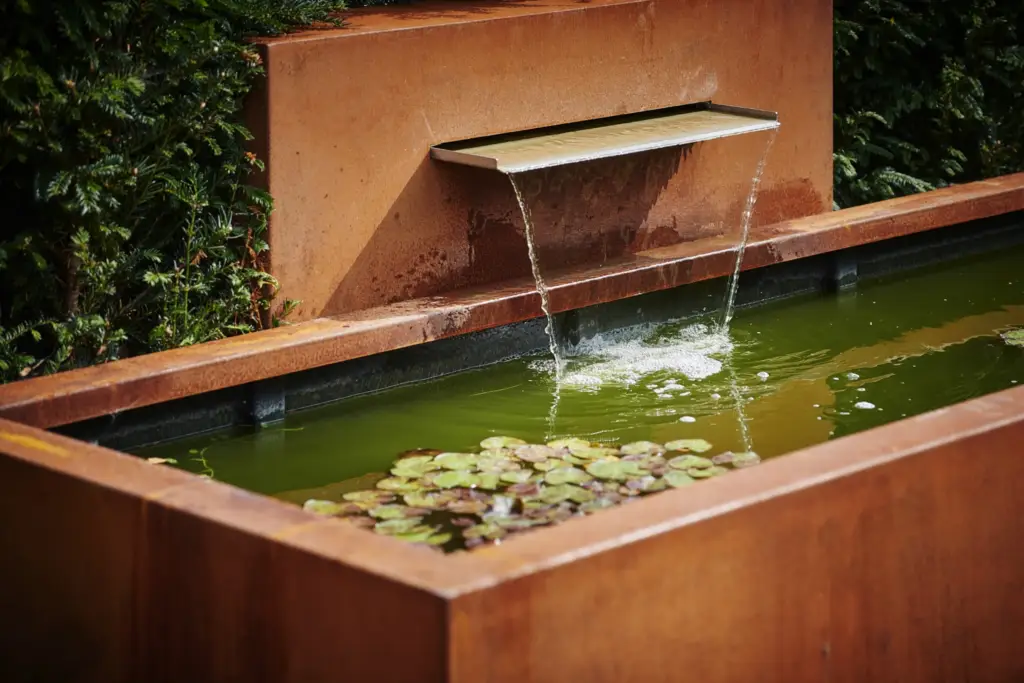 Water feature detail within a Refined Landscapes garden