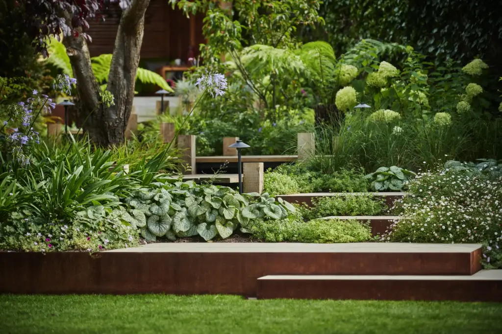 Layered planting in a completed Refined Landscapes garden