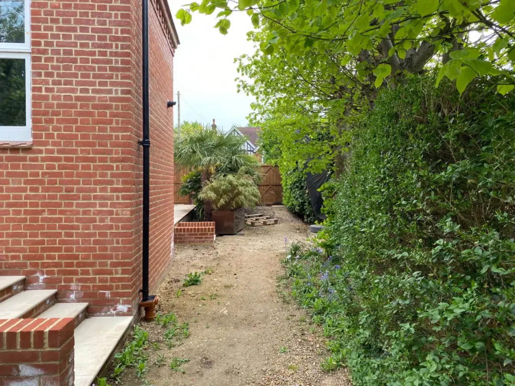 The Edwardian Garden — Side Passage & Brick Pathway before