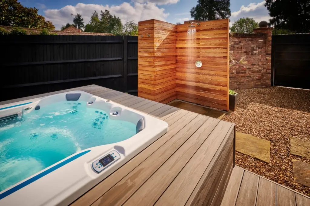 Swim spa with cedar outdoor shower and composite decking