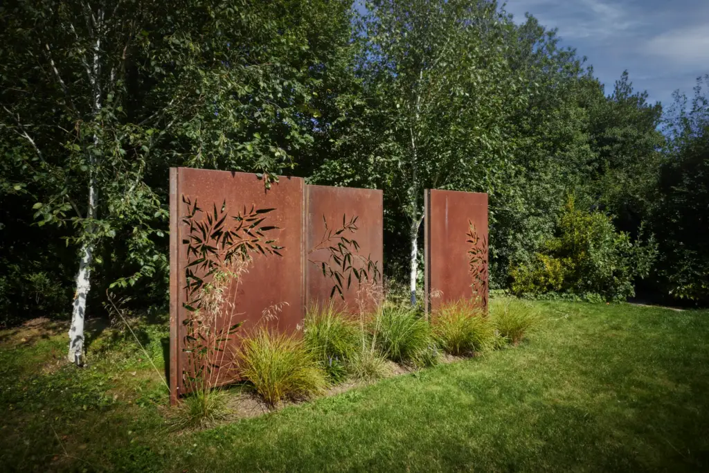 Steel Adezz screens and Corten focal features in a contemporary Hertfordshire garden